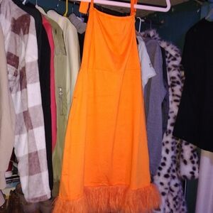 Vibrant Orange Dress with Feather Hem